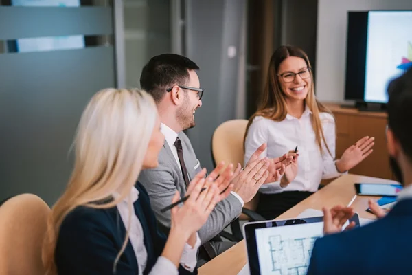 employees clapping for each others success