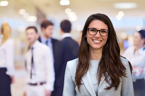 female CEO executive on office background